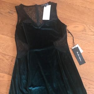 a very cute  dark green and black lace dress